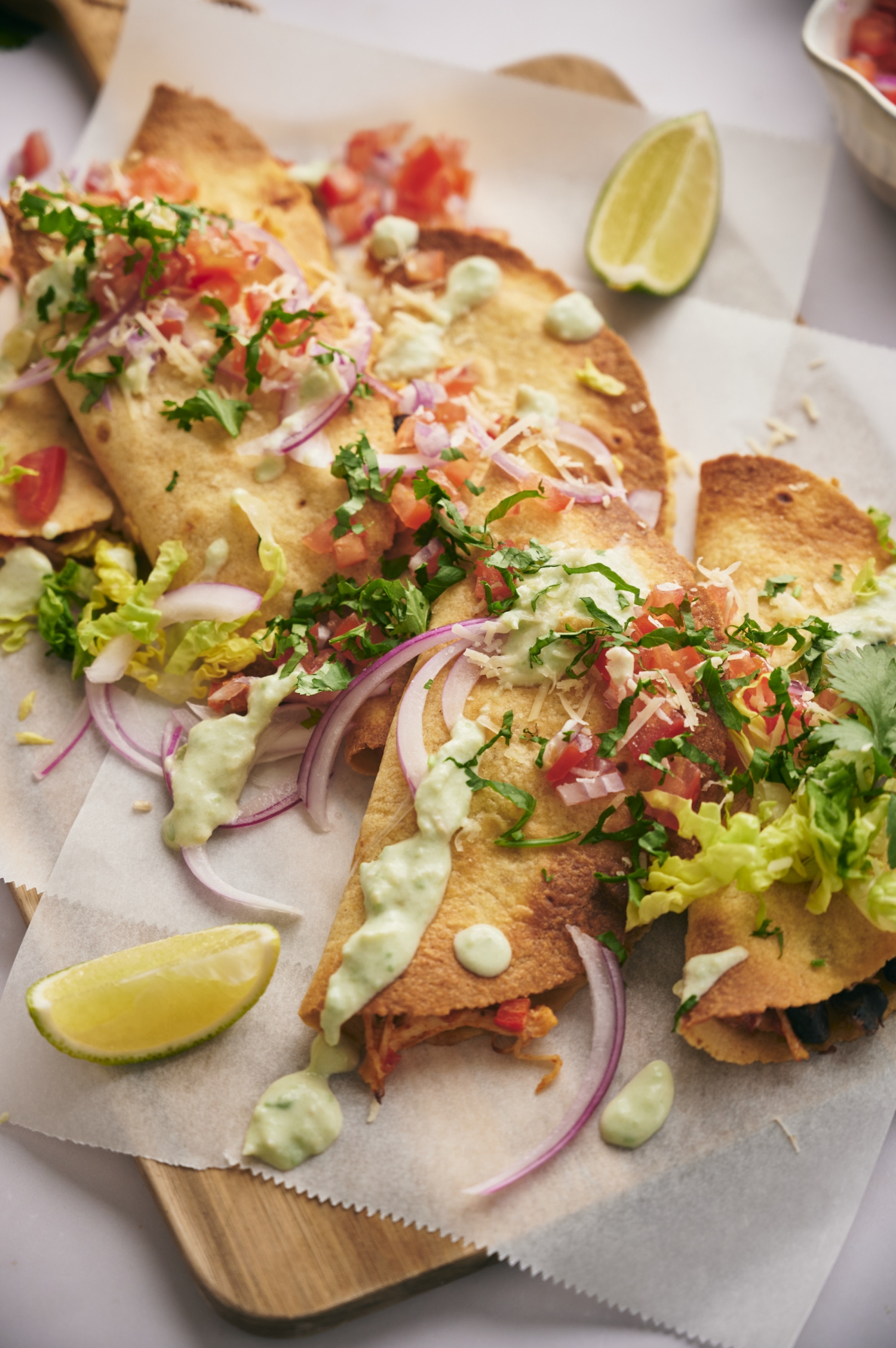 Crunchy chicken tacos with crispy tortillas filled with chicken, beans, and cheese.