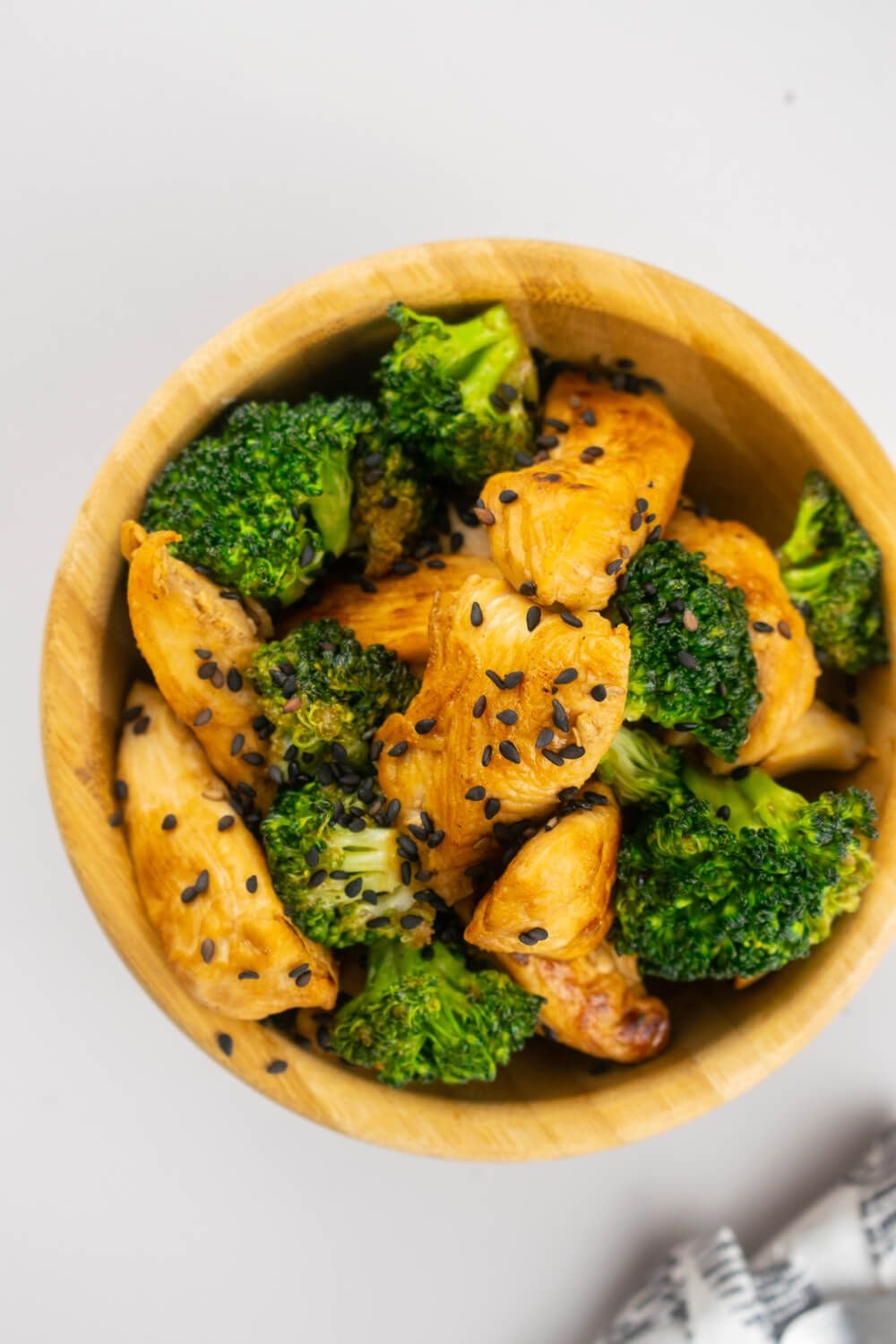 Chinese chicken and broccoli stir fry with sesame seeds.