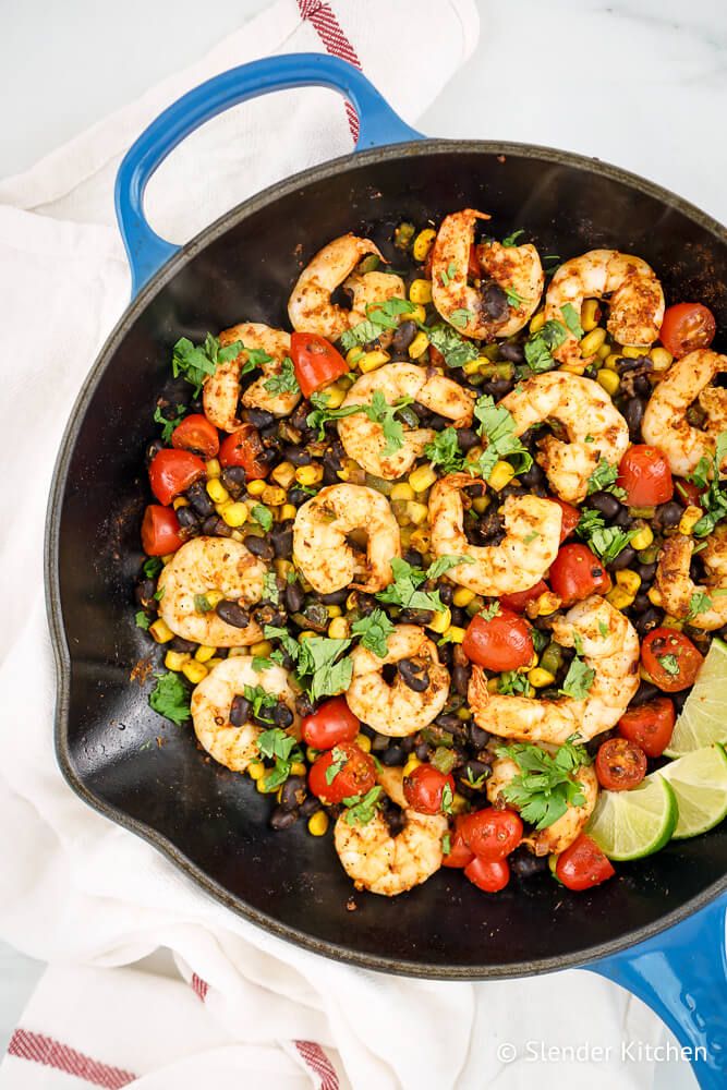 Mexican shrimp cooked with corn, black beans, cherry tomatoes, and onions topped with cilantro and lime.