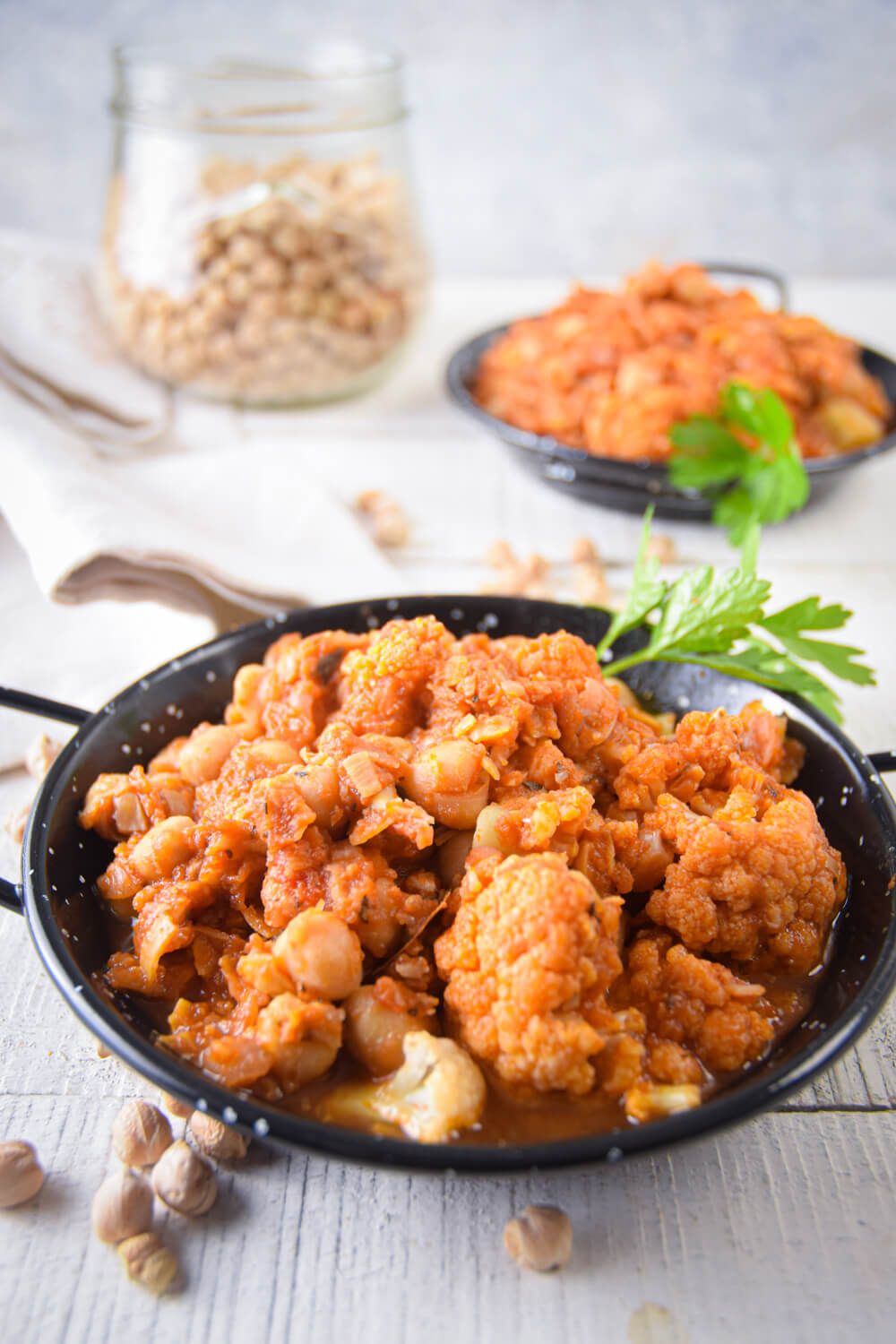 Crockpot Chickpea Tikka Masala with cauliflower in a spiced tomato sauce with cilantro.