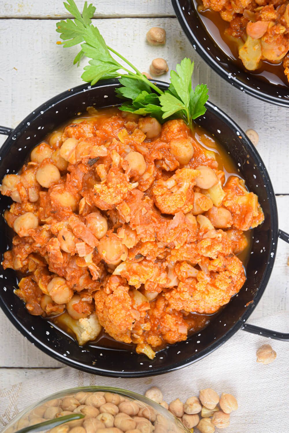 Chickpea Masala with cauliflower in a rich tomato sauce that