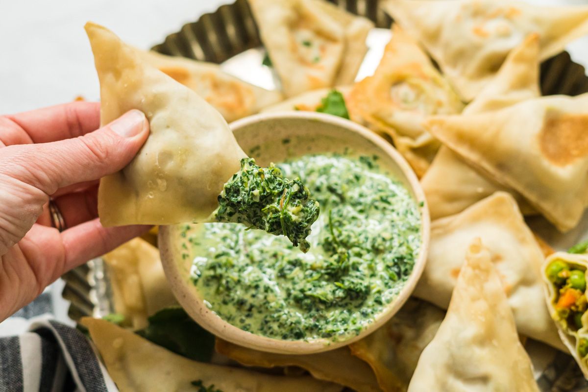 Cauliflower and potato samosa baked and served with cilantro mint dipping sauce.