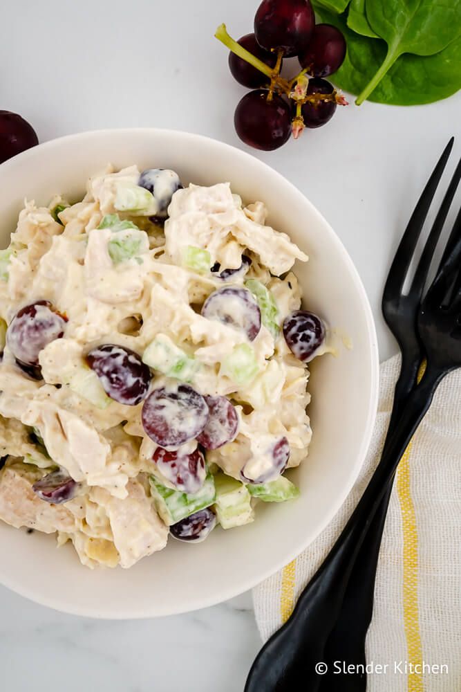 Healthy chicken salad and grapes in a bowl with celery and Greek yogurt Dijon dressing.