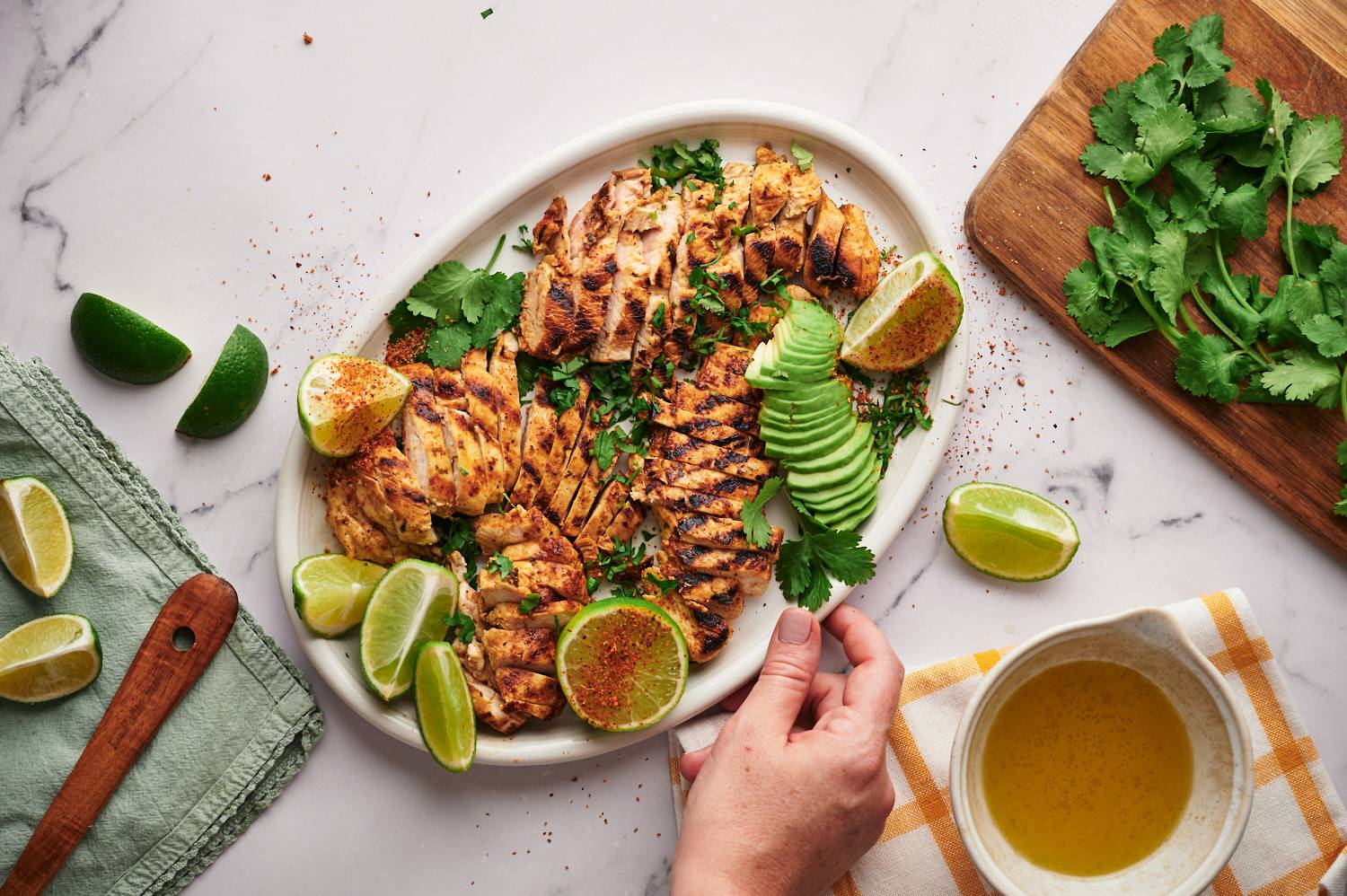 Grilled chicken with chili lime marinade served with lime, avocado, and cilantro.