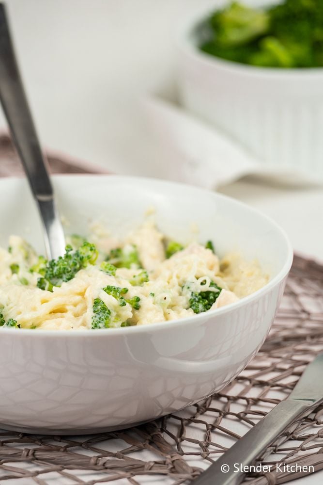 Chicken and Broccoli Spaghetti Squash in a bowl with Parmesan sauce.