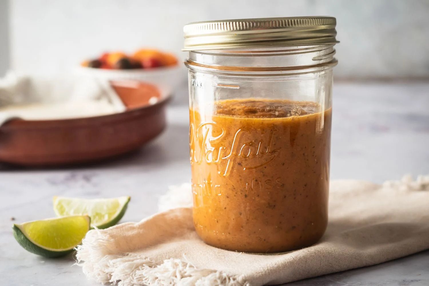 Jar of ranchero sauce with tomatoes and chili peppers for fajitas.