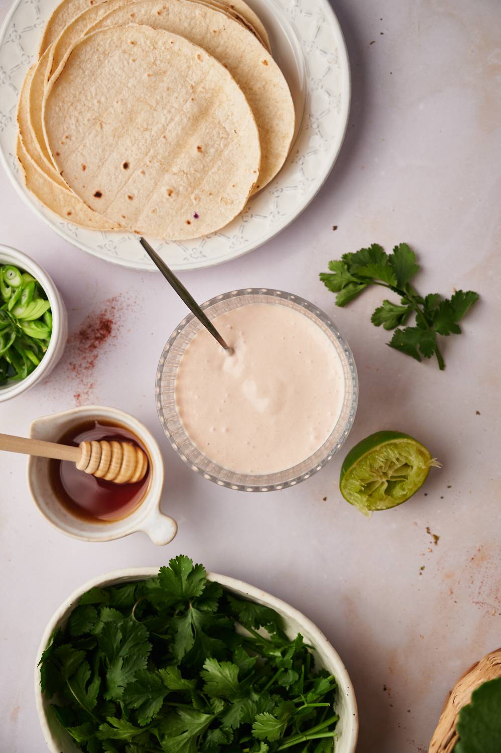 Classic fish taco sauce in a bowl made with Mexican crema, yogurt, chipotle peppers, and lime juice.