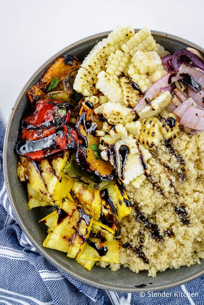 Grilled Balsamic Vegetables with quinoa and balsamic glaze in a bowl.