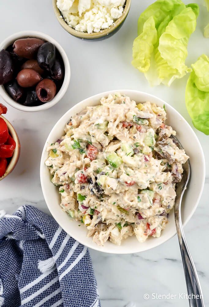 Chicken salad with mediterranean flavors like olives, feta cheese, red peppers, cucumbers, and more.