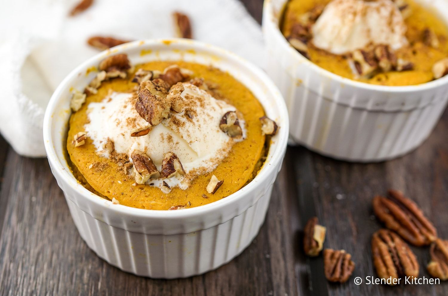 Microwave Pumpkin Custard with chopped nuts and whipped cream.