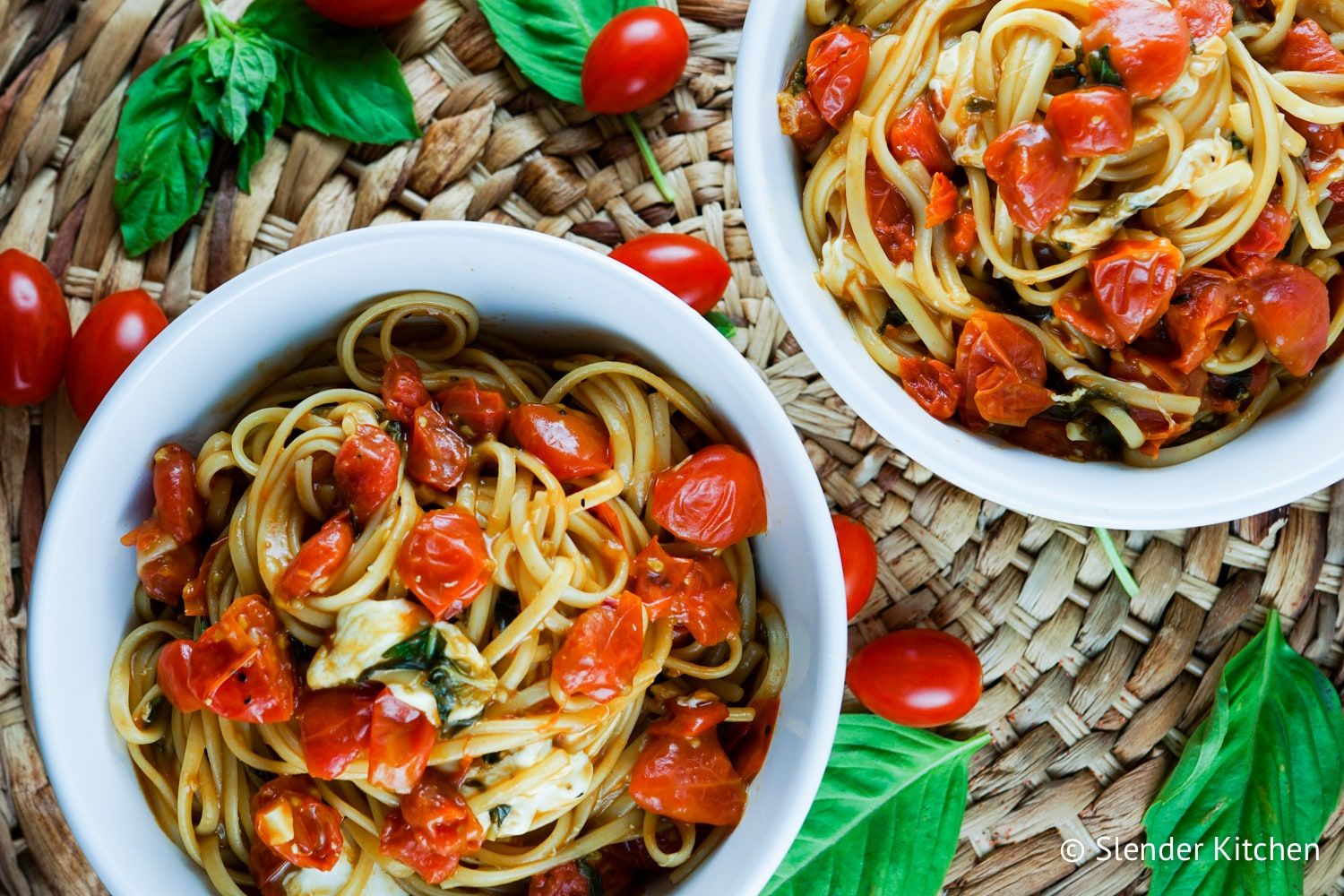 One Pot Caprese Pasta served with fresh basil and balsamic vinegar.