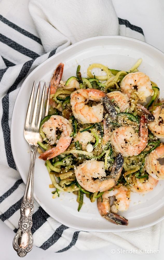 Pesto Shrimp with Zucchini Noodles on a white linen.