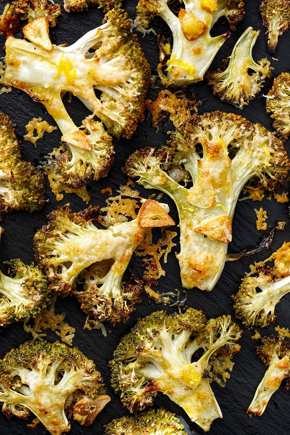 Parmesan Roasted  Broccoli in a sheet pan with garlic and lemon. 