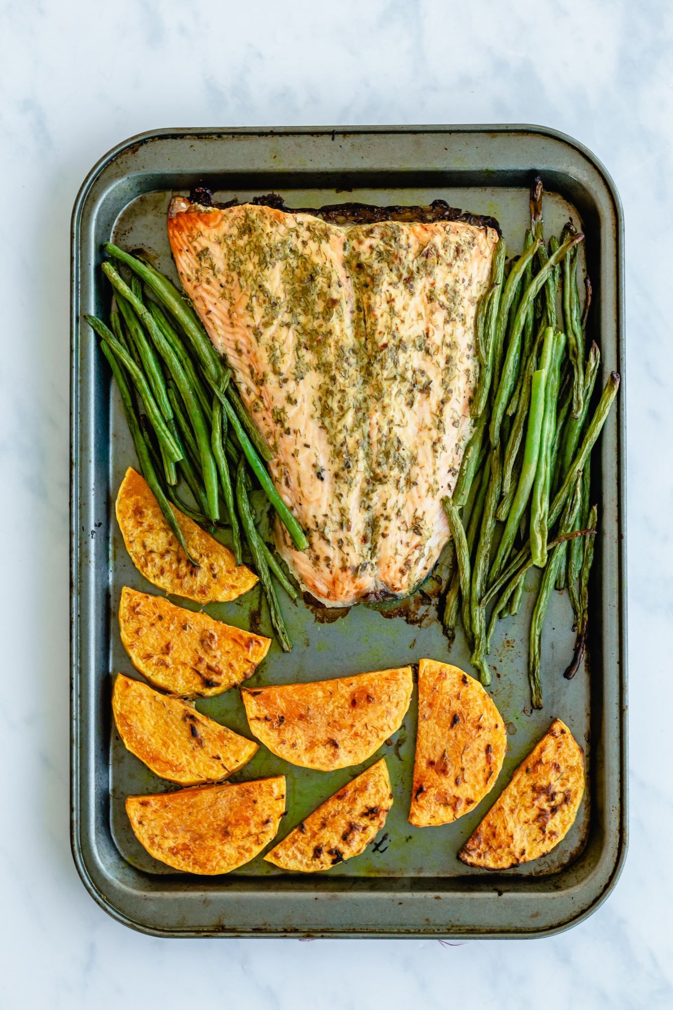 Sheet pan salmon with mustard herb sauce, green beans, and butternut squash.