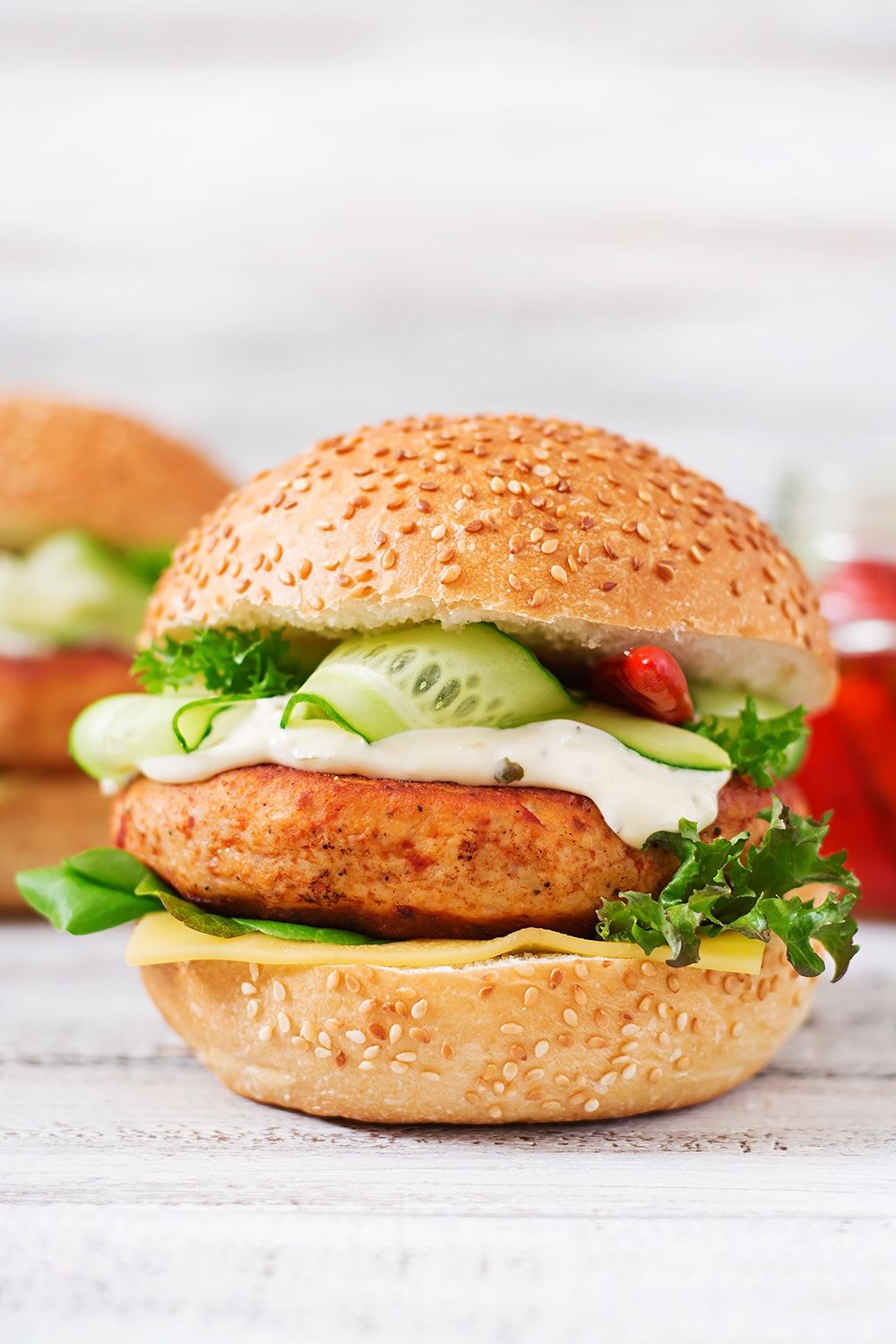 Tilapia Fish Burgers with a simple yogurt sauce and cucumber.