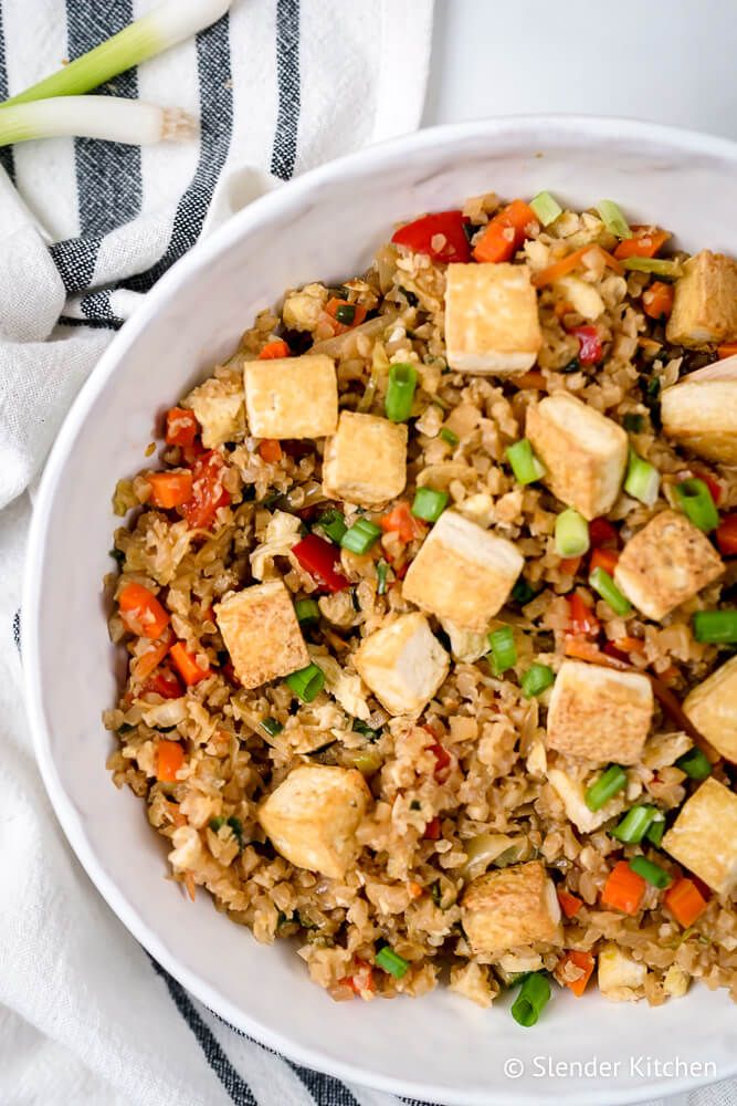 Cauliflower Fried Rice with tofu, carrrots, red peppers, garlic, ginger, and soy sauce.