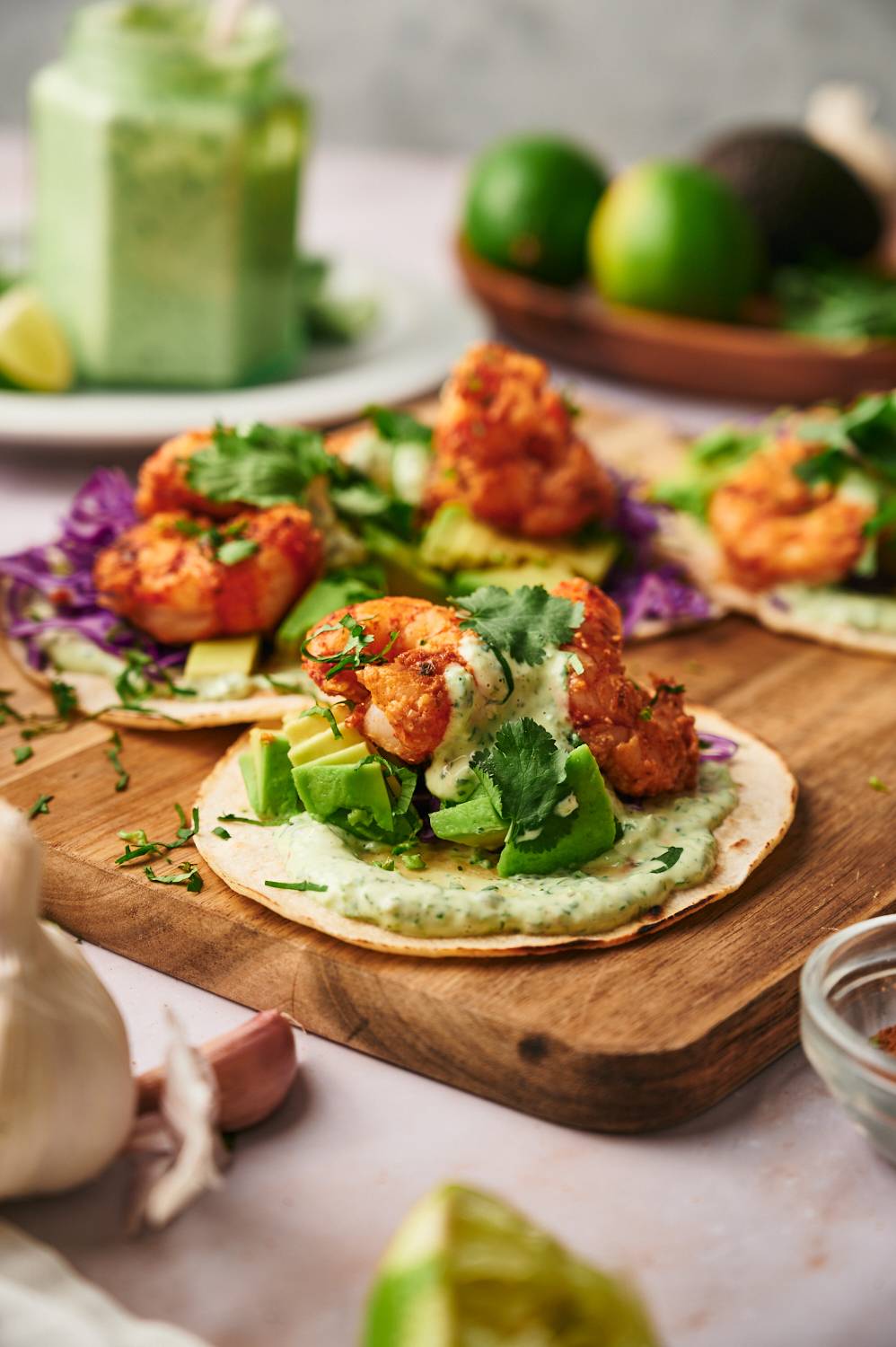 Seafood recipes from Mexico including a shrimp taco with avocado, cabbage, and cilantro lime sauce.