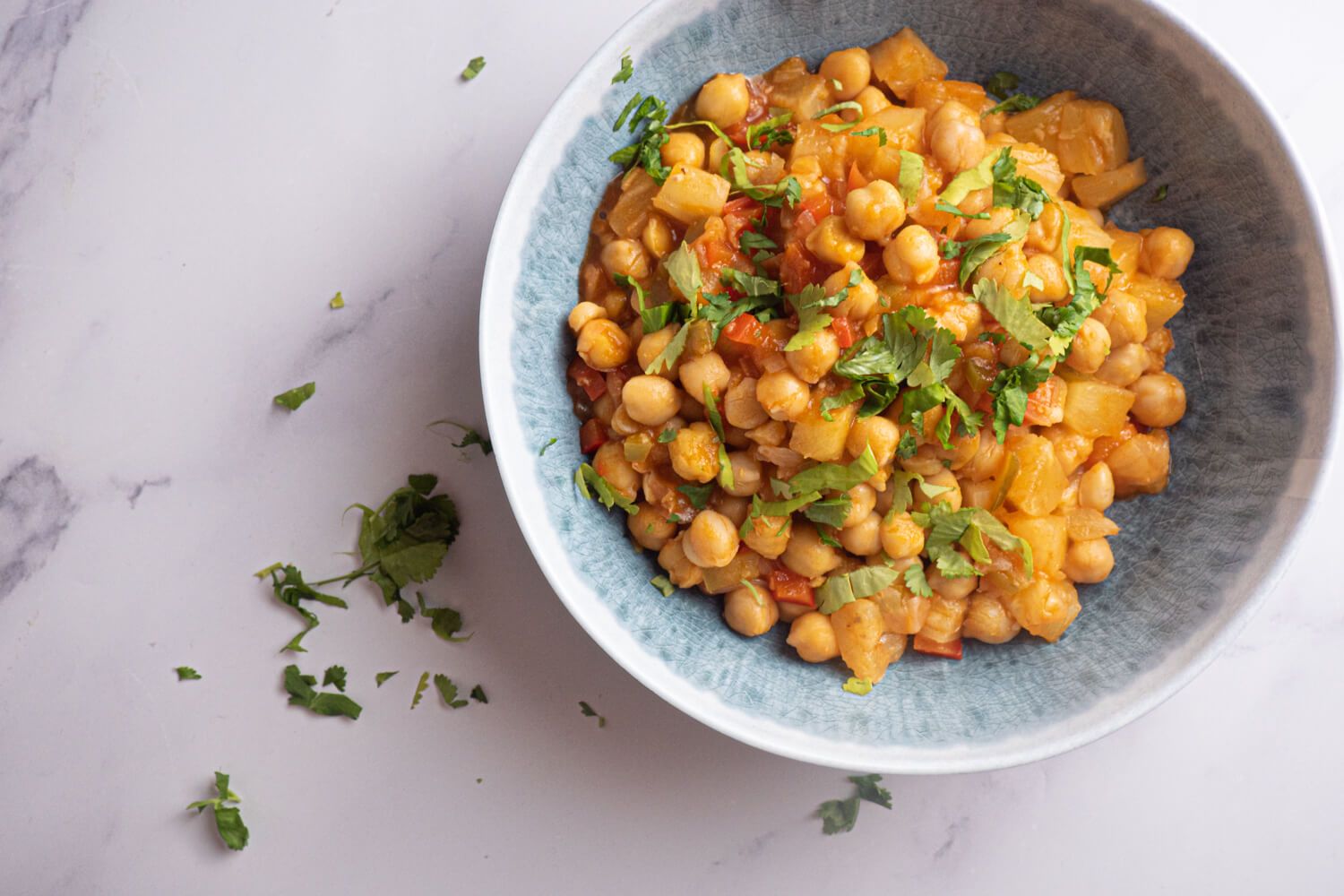 Slow cooker sweet and sour chickpeas with pineapple in a bowl.