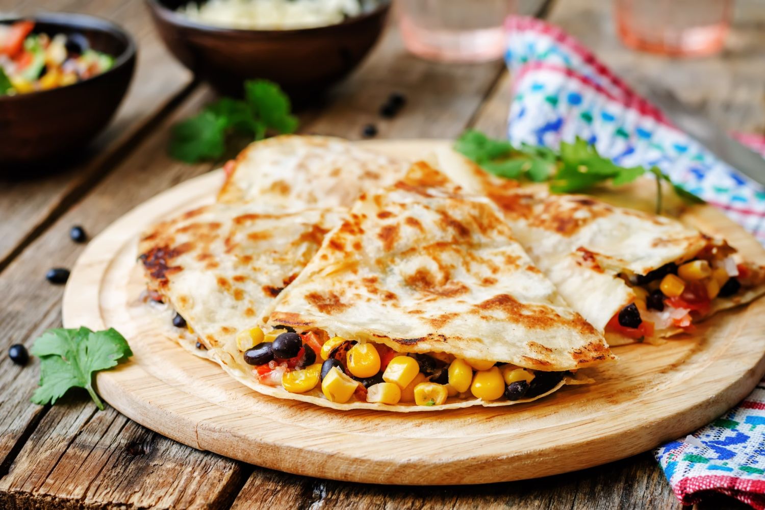 Black Bean and Corn Quesadillas in a flour tortilla with cilantro.