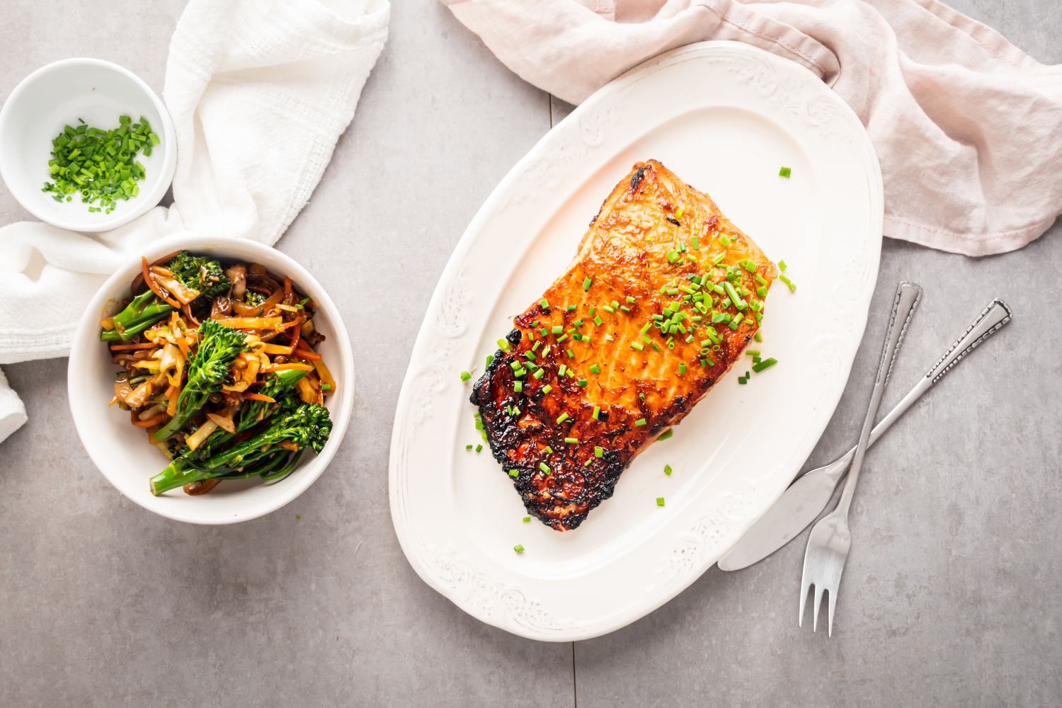 Brown sugar salmon with a crispy top and served with stir fried vegetables. 