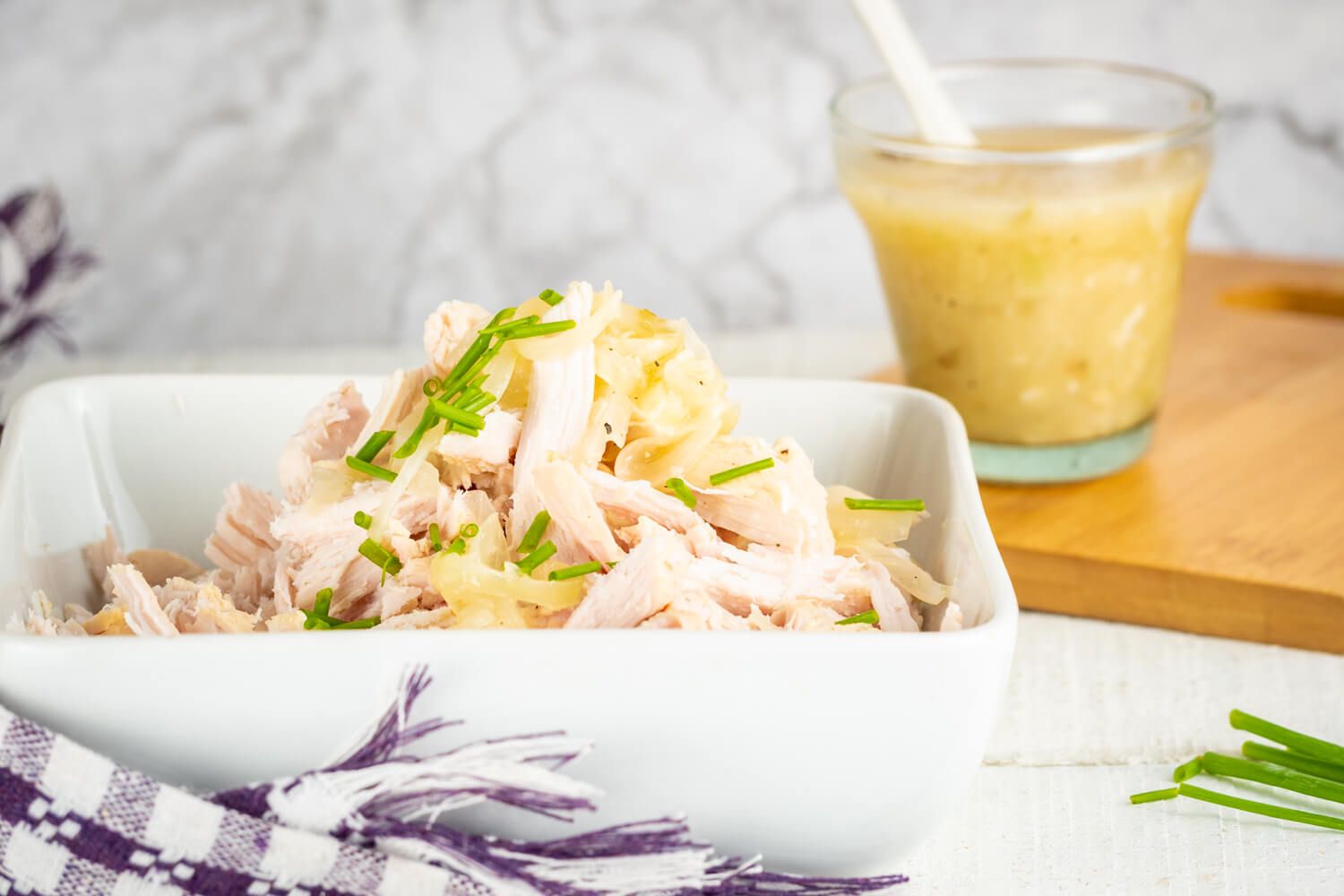 Slow Cooker Lemon Garlic Chicken with onions, fresh lemon, and lots of garlic.