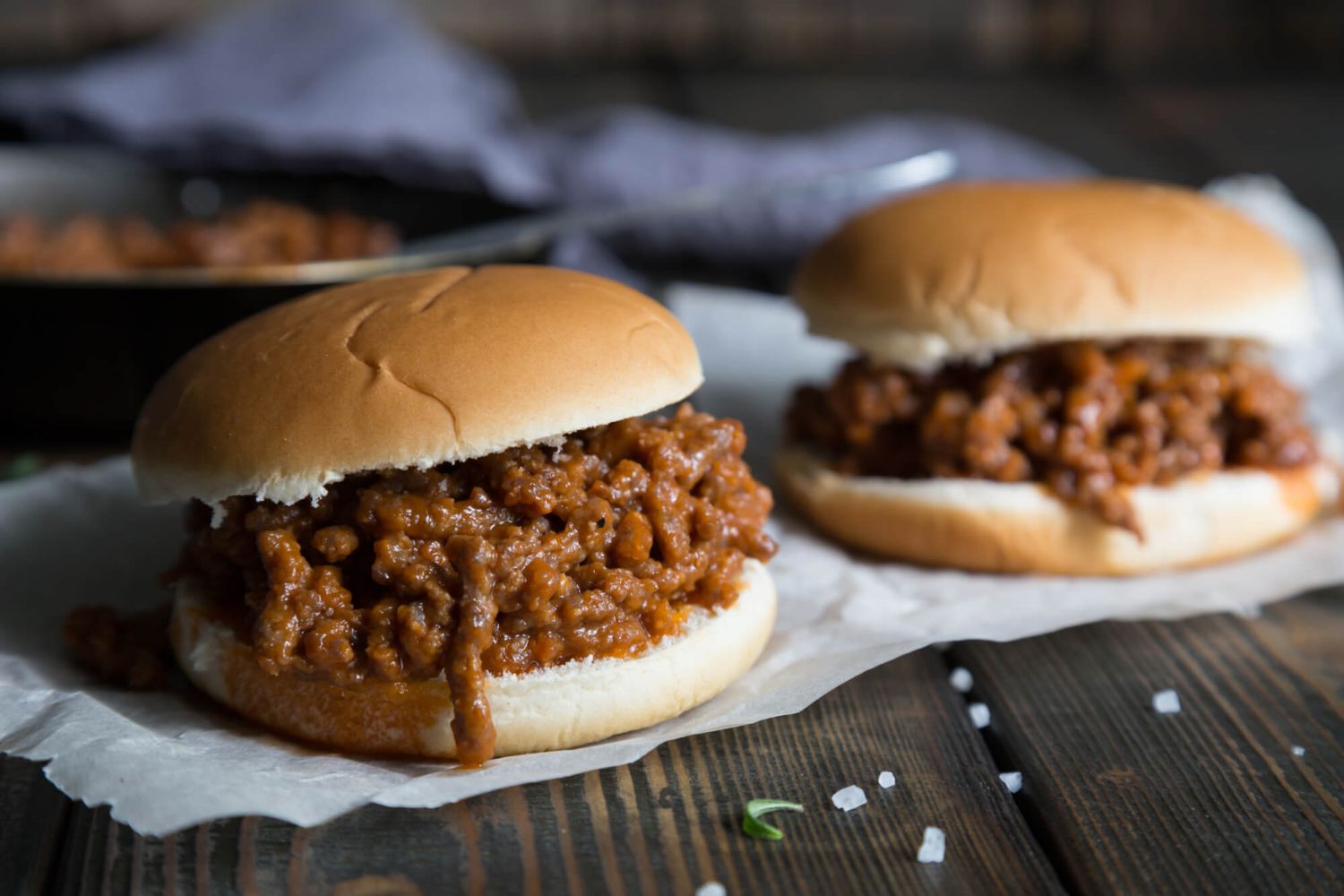 Three ingredient sloppy joes in sauce in hamburger buns.