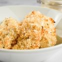 Homemade Fish Sticks in a bowl with a crispy panko and Parmesan crust.