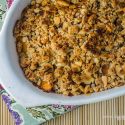 Apricot crumble with a crispy baked topping in a ceramic dish.