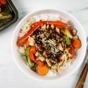 Asian rice bowls with white rice, vegtables, ground turkey, and soy sauce.