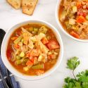 Vegetable Soup with cabbage, green beans, corn, peas, tomatoes, and more.