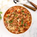 Healthy cabbage soup with cabbage, ground turkey, tomatoes, and cauliflower rice in a bowl.