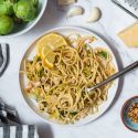 Lemon Brussels sprouts and Parmesan pasta with whole wheat spaghetti , shaved Brussels sprouts, lemon, white beans, and Parmesan cheese.