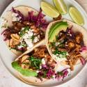 Mushroom tacos with crispy mushrooms, red cabbage slaw, queso fresco, and avocado on corn tortillas.