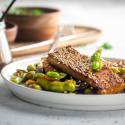 Pan fried tofu cooked in an Asian sauce with edamame and sesame seeds.