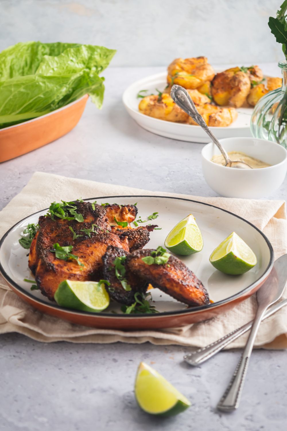 Chicken with homemade blackening spices seared until crispy and served with potatoes and dipping sauce.