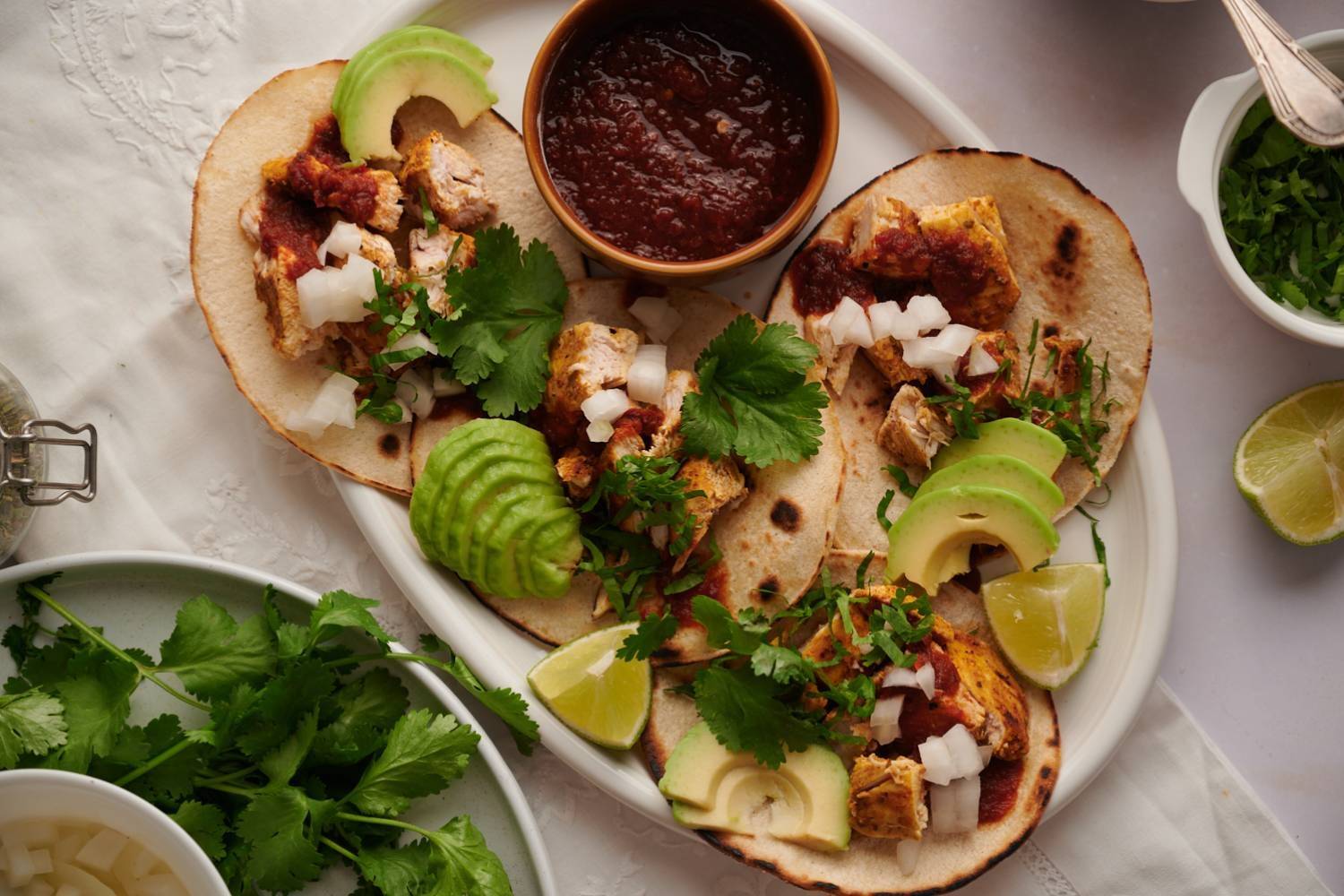 Grilled chicken tacos on a plate.