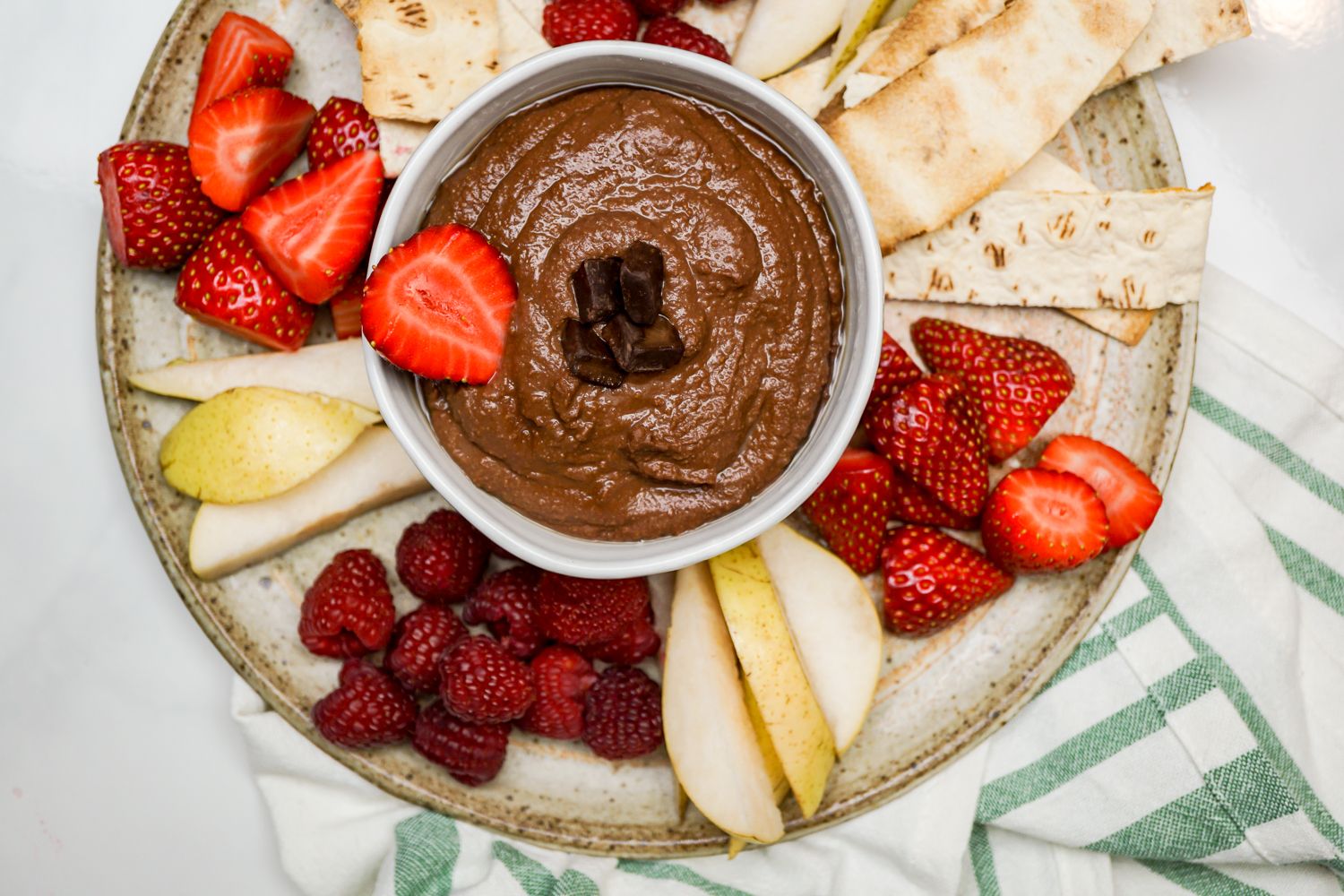 Brownie Batter Hummus with fresh fruit for meal planning.