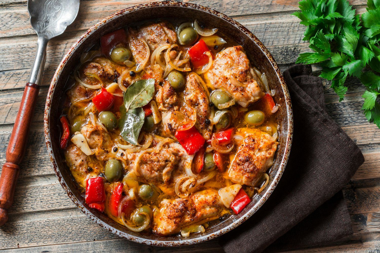 Slow Cooker Mediterranean Chicken is an Italian inspired dish with olives, capers, and red peppers.