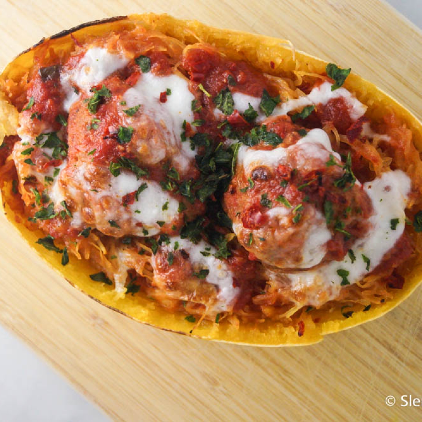 Spaghetti squash and meatballs with marinara sauce and melted fresh mozzarella cheese.