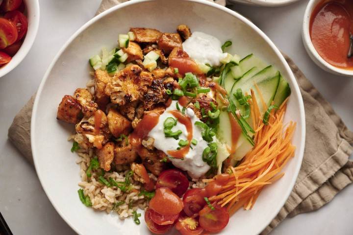 Buffalo chicken bowl plated and ready to eat.