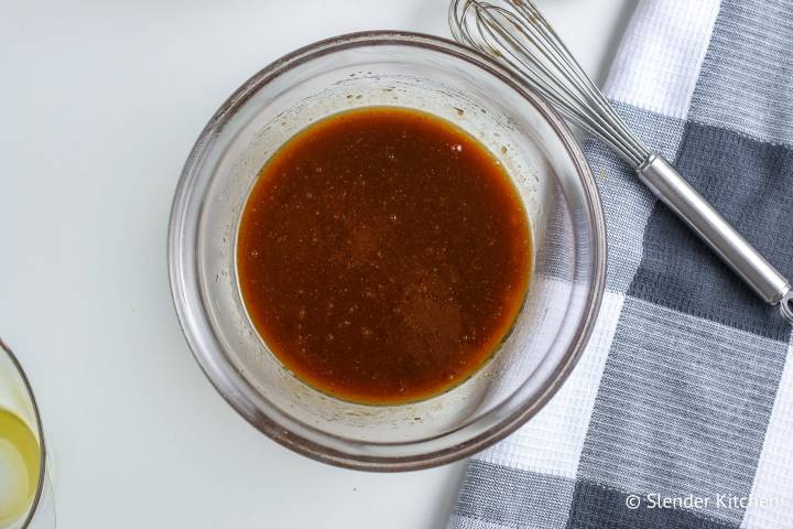 Fully mixed balsamic vinegar dressing in a bowl.