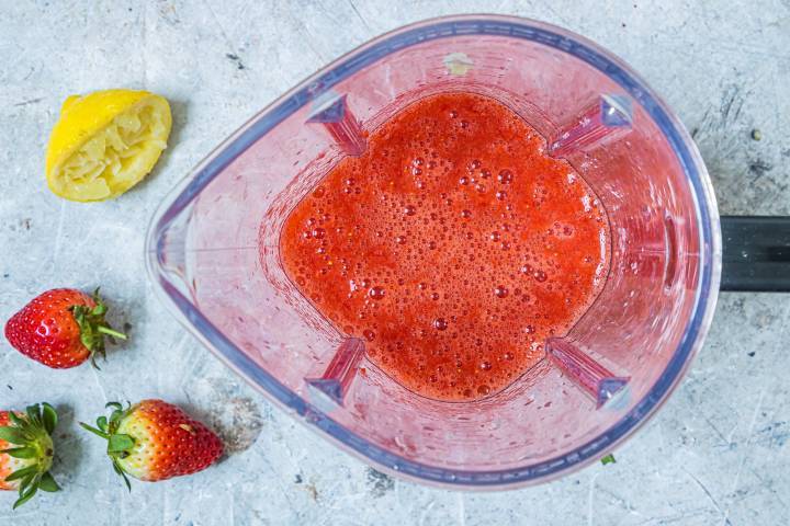 Strawberries, water, and honey blended.