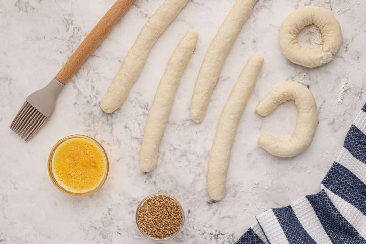 Greek yogurt dough rolled into long ropes and then into bagels.