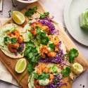 Mexican seafood tacos made with shrimp, avocado, and cilantro lime sauce. 