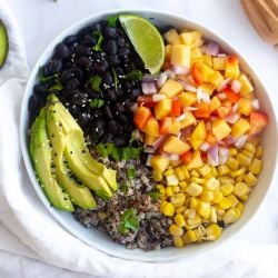 Cuban black bean bowl with bell peppers, cilantro, quinoa, and lime juice.