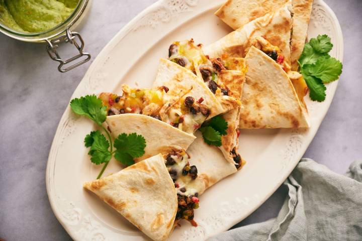 Leftover turkey quesadillas with shredded turkey, black beans, and corn.