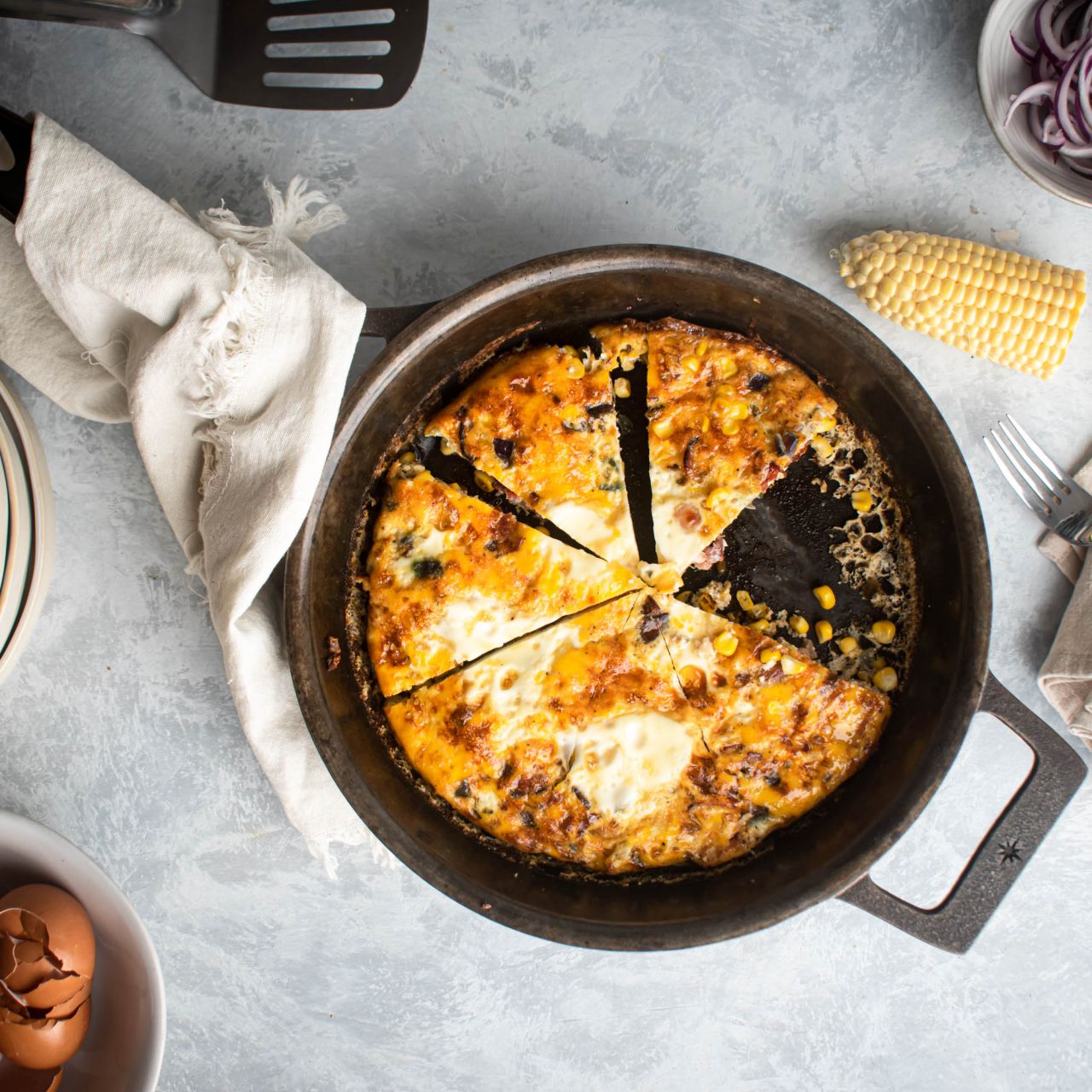 https://www.slenderkitchen.com/sites/default/files/styles/gsd-1x1/public/recipe_images/corn-bacon-frittata_0.jpg