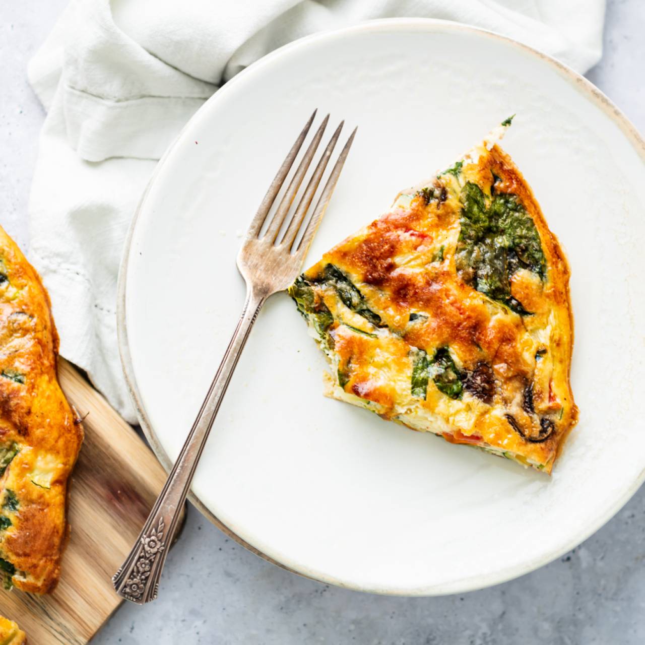 https://www.slenderkitchen.com/sites/default/files/styles/gsd-1x1/public/recipe_images/vegetable-frittata.jpg