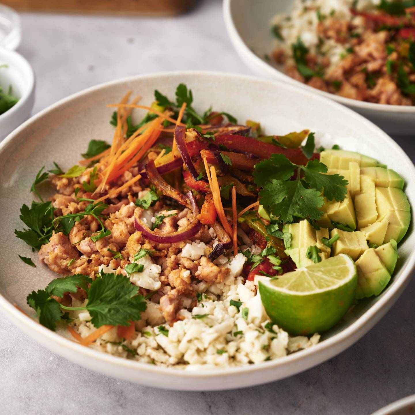 https://www.slenderkitchen.com/sites/default/files/styles/gws_sq_1440/public/steps/cauliflower-rice-taco-bowls-step-4.jpg