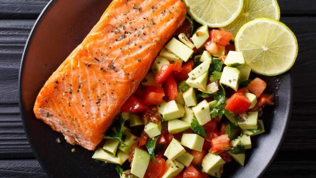 Healthy Salmon recipe with honey lime dressing and avocado salsa.